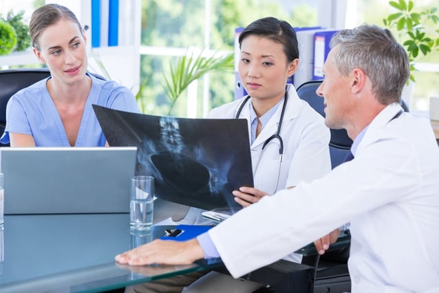 Group of doctors talk about CMS removing chronic care management payment barriers and focusing on preventive care. Group of doctors talk about CMS removing chronic care management payment barriers and focusing on preventive care.